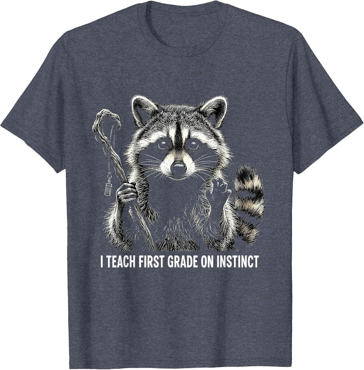 I Teach First Grade On Instinct Funny Raccoon Teacher Humor T-Shirt - Heather Blue